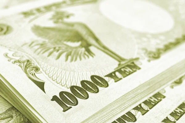 1万円札の束 ライトグリーンまたはオリーブの着色された背景 日本経済の背景 人口1万人 マクロ — ストック写真