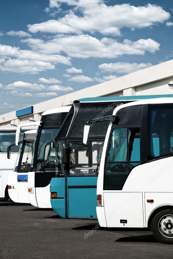 buses at the bus station with cloudy sky