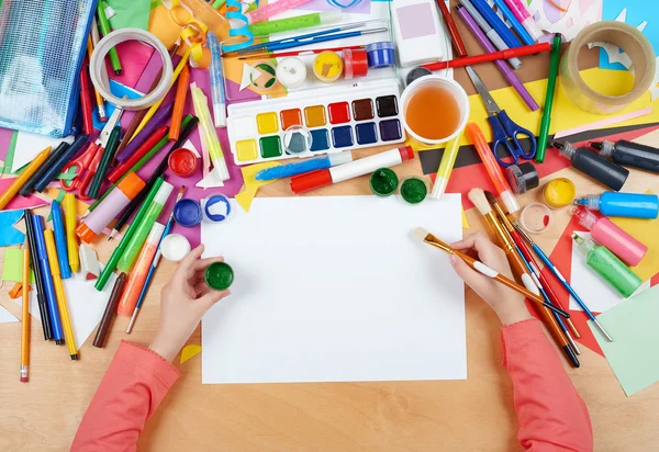 Child drawing top view. Artwork workplace with creative accessories. Flat lay art tools for painting. — Stock Photo, Image