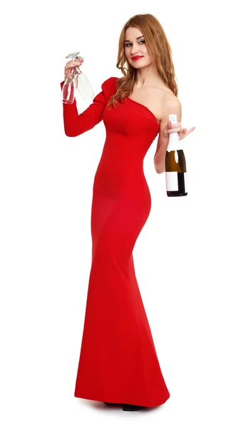 Mädchen im roten Kleid mit Champagner und Weinglas auf weißem Grund — Stockfoto