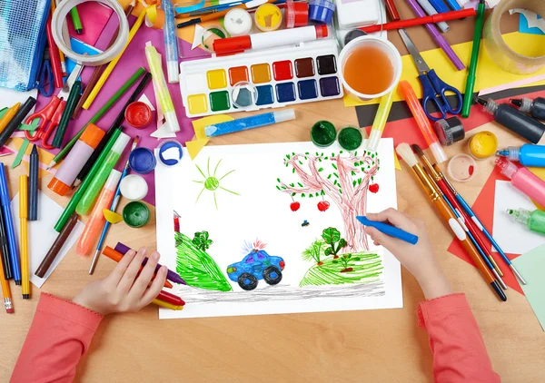 Police car on outdoor, child drawing, top view hands with pencil painting picture on paper, artwork workplace — Stock Photo, Image