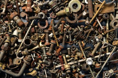 Eski el aletlerinin arka planı - farklı vida ve fındık setleri