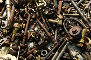 Eski el aletlerinin arka planı - farklı vida ve fındık setleri