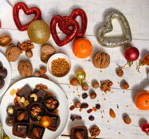 Noel Tatil Süslemeleri Için Tatlı Yemek Arkaplanı Çikolata Şekerlemeleri Mandalinalar — Stok fotoğraf