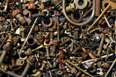 Eski el aletlerinin arka planı - farklı vida ve fındık setleri