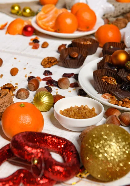 Fondo Alimentos Dulces Para Navidad Decoración Navideña Caramelos Chocolate Mandarinas — Foto de Stock