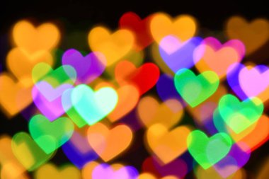 Tatil ya da soyut sahte arkaplan için renkli kalp aydınlatması