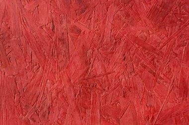 Ahşap zemin kırmızıya boyanmış, yeni ve temiz yüzey, ahşap parçalarından yapılmış baskılı plaka.