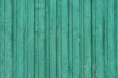 Eski ahşap arka plan. Yeşile boyanmış tahtalar.