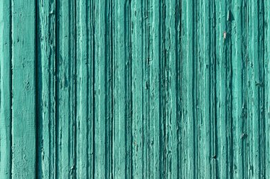 Eski ahşap arka plan. Yeşile boyanmış tahtalar.