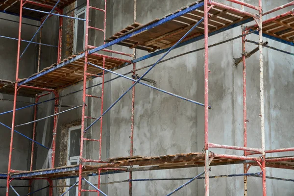 renovation or repair of a building facade using scaffolding