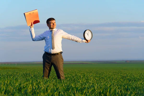 Businessman Holds Office Clock Red Folder Field Green Grass Business — Stock Photo, Image