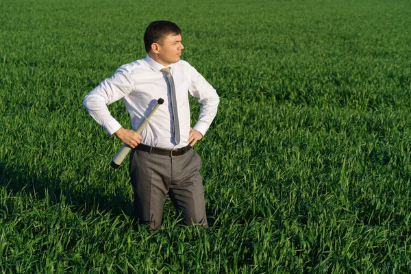 Businessman Poses Spyglass Looks Distance Looks Something Green Grass Blue — Stock Photo, Image