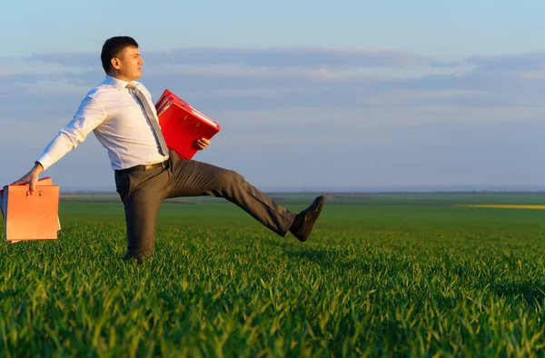 Businessman Walks Green Grass Field Holds Office Red Folder Documents — Stock Photo, Image