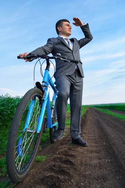 Businessman Bicycle Poses Wheaten Field Green Grass Blue Sky Background — Stock Photo, Image