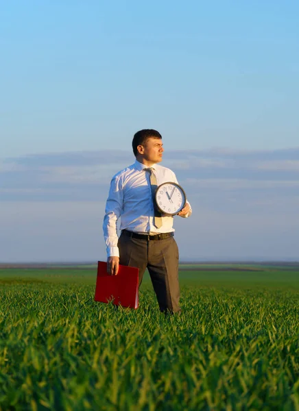 Businessman Holds Office Clock Red Folder Field Green Grass Business — Stock Photo, Image