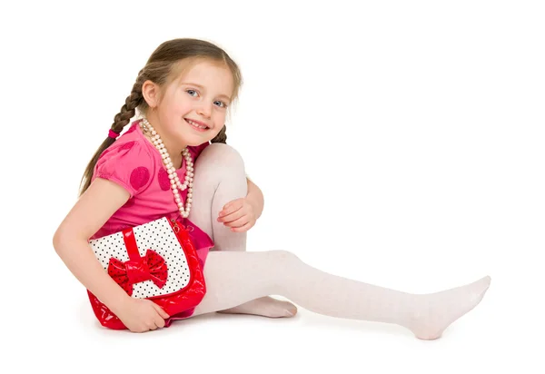 Chica con un vestido rojo. plano de estudio — Foto de Stock