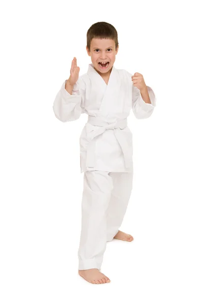 Chłopiec w stawianiu białe kimono — Zdjęcie stockowe