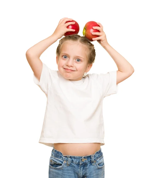 Meisje met groenten en fruit op wit — Stockfoto