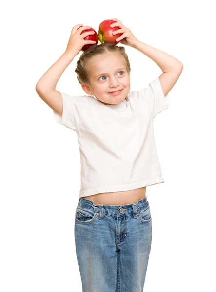 Meisje met groenten en fruit op wit — Stockfoto