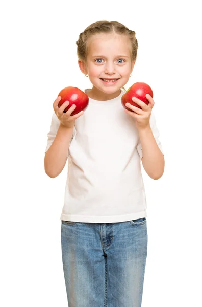 Kleines Mädchen mit Obst und Gemüse auf weißem Grund — Stockfoto