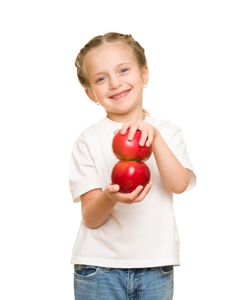 Meisje met groenten en fruit op wit — Stockfoto