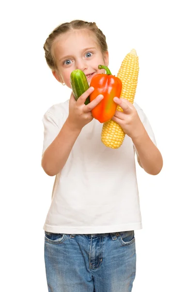 Meisje met groenten en fruit op wit — Stockfoto