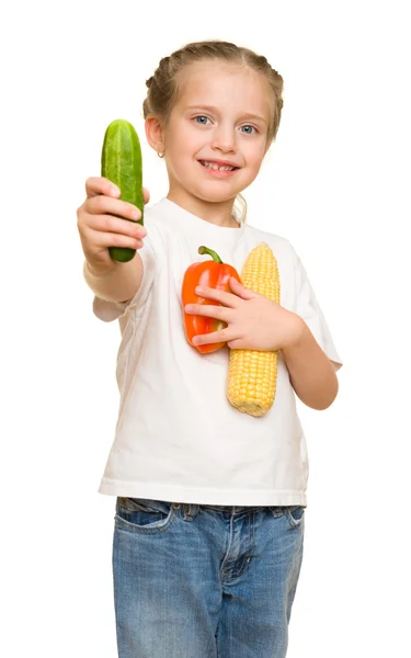 Meisje met groenten en fruit op wit — Stockfoto