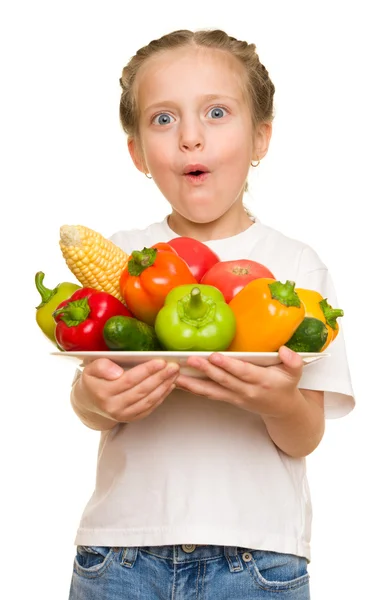 Little girl with fruits and vegetables on white — Stock Photo, Image