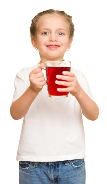 Kleines Mädchen mit einem Glas Saft — Stockfoto