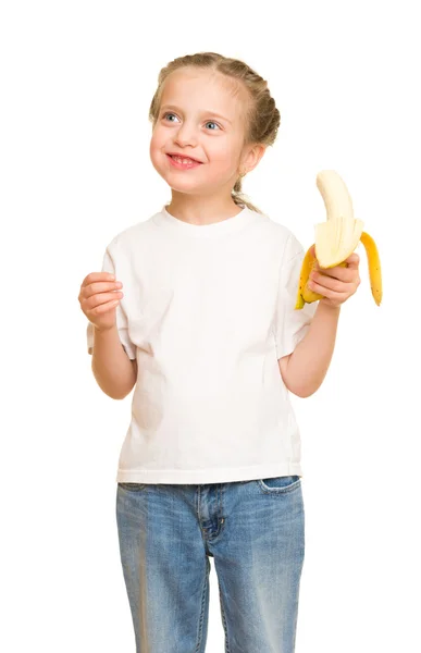 Bambina mangiare banana — Foto Stock