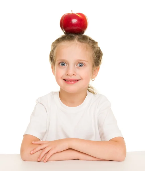 Kleines Mädchen mit Apfel — Stockfoto