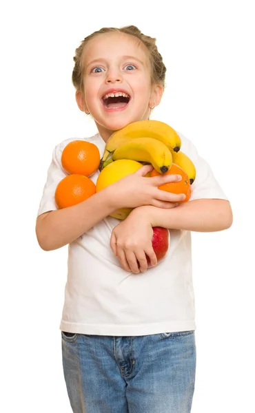 Little girl with armful fruits — Stock Photo, Image