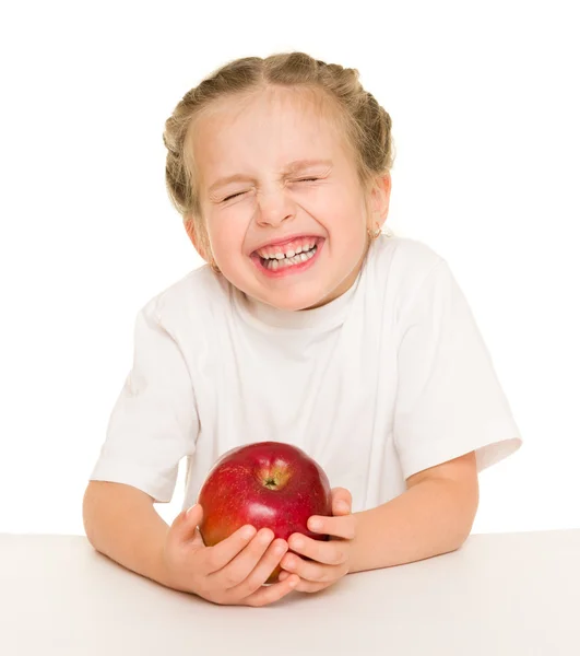 Little girl with apple — Stock Photo, Image