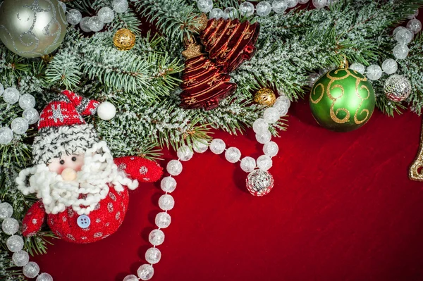 Kerstmis achtergrond met decoraties en speelgoed — Stockfoto