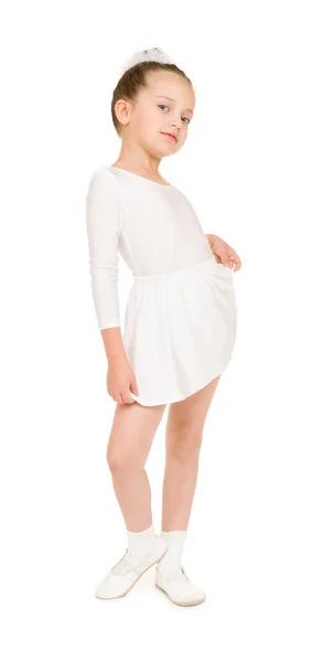 Liten flicka dansa i en vit balklänning — Stockfoto