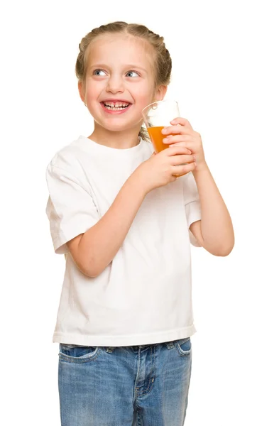 Bambina con un bicchiere di succo — Foto Stock