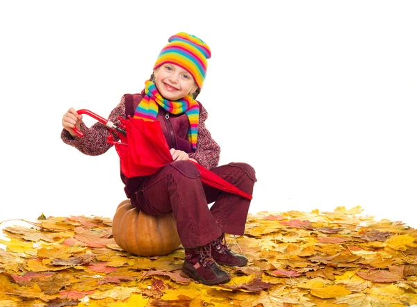 Meisje met paraplu op Herfstbladeren op wit — Stockfoto