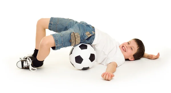 Junge mit Fußballball — Stockfoto