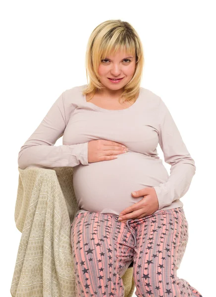 Pregnant woman on chair — Stock Photo, Image