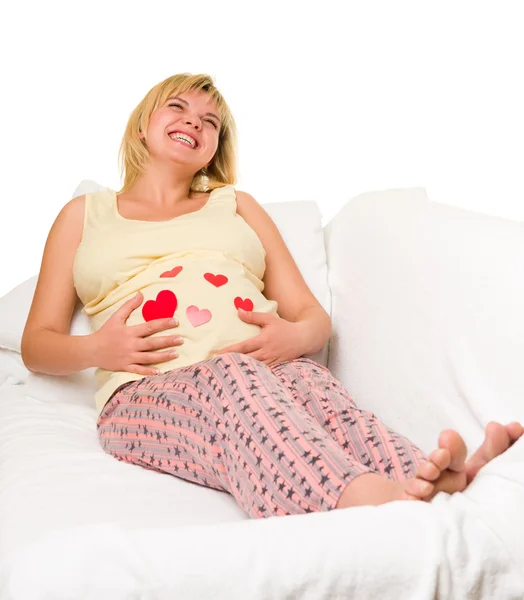 Happy pregnant woman with hearts — Stock Photo, Image
