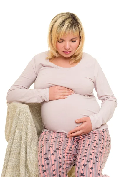 Pregnant woman on chair — Stock Photo, Image