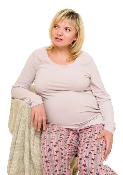 Pregnant woman on chair — Stock Photo, Image