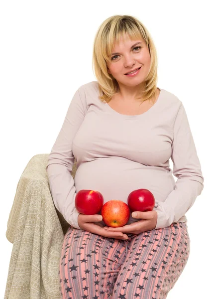 Pregnant woman with apples — Stock Photo, Image