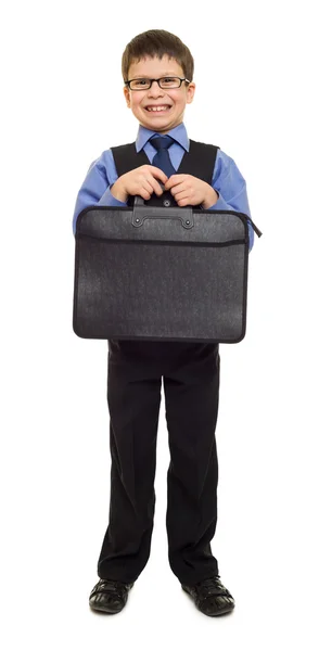 Мальчик в костюме с портфелем — стоковое фото