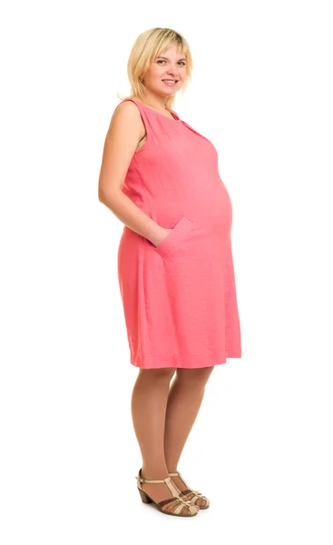 Pregnant woman in red dress — Stock Photo, Image