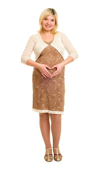 Pregnant woman in brown dress — Stock Photo, Image