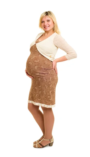 Pregnant woman in brown dress — Stock Photo, Image