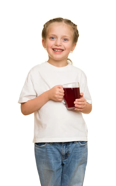 Kleines Mädchen mit einem Glas Saft — Stockfoto