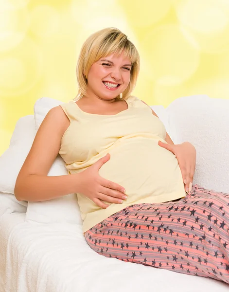 Pregnant woman in bed. — Stock Photo, Image